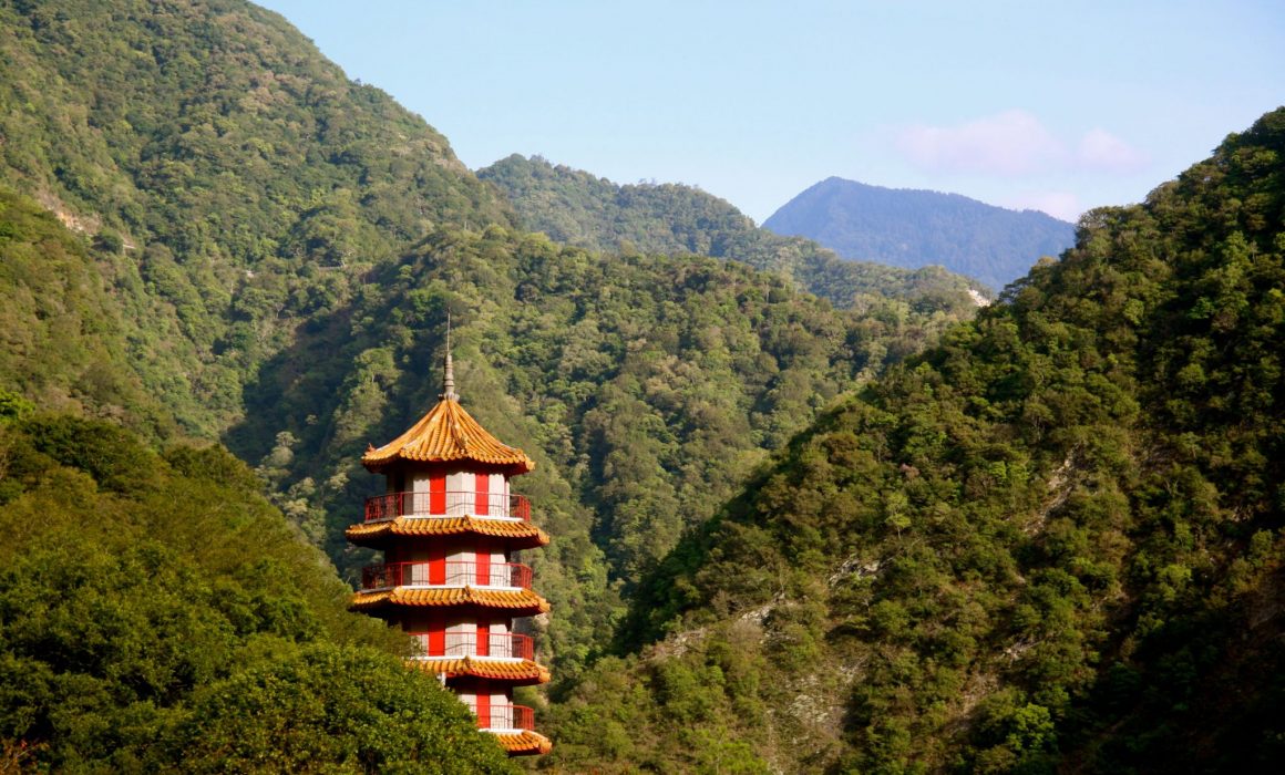 Tower rising from green hills in Taiwan