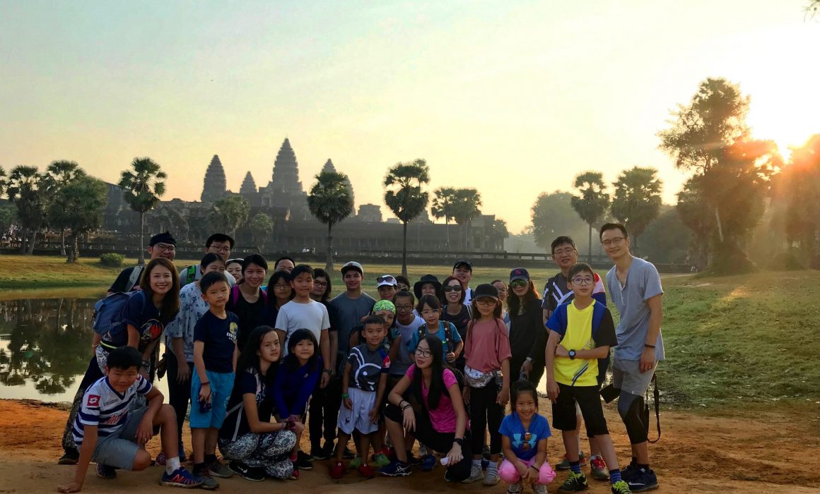 Group of children in front of Angkor Wat