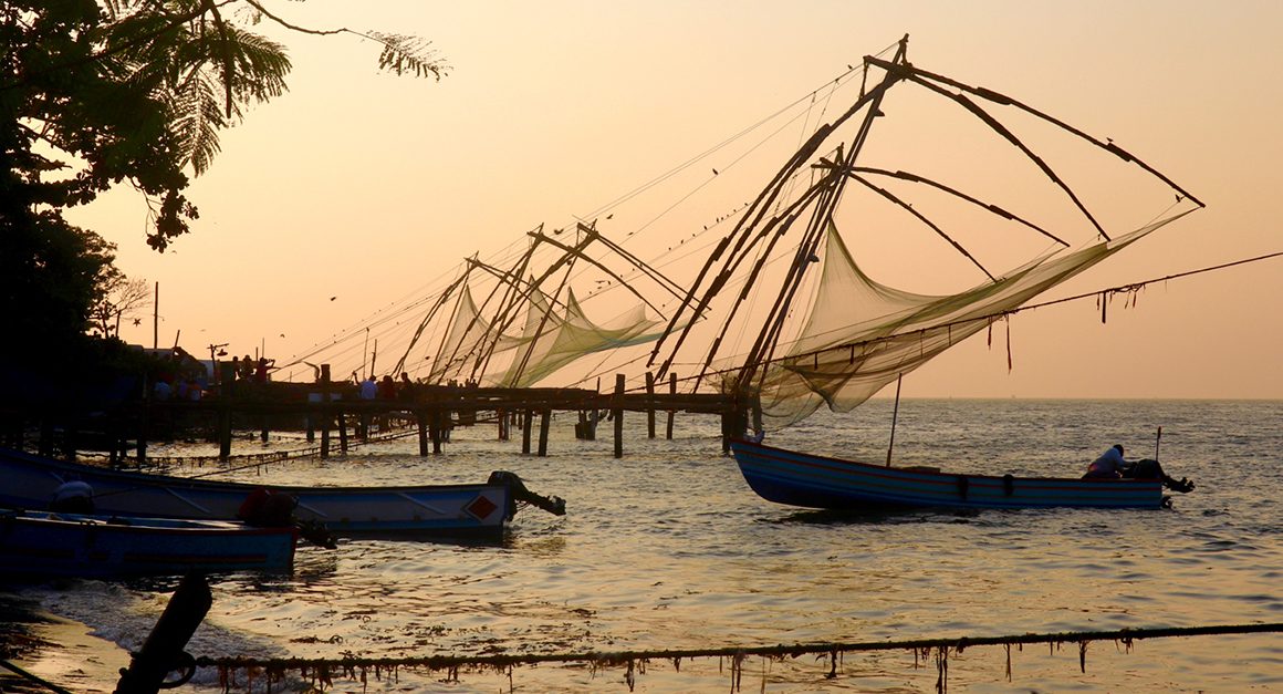 Fishing nets and boats over water