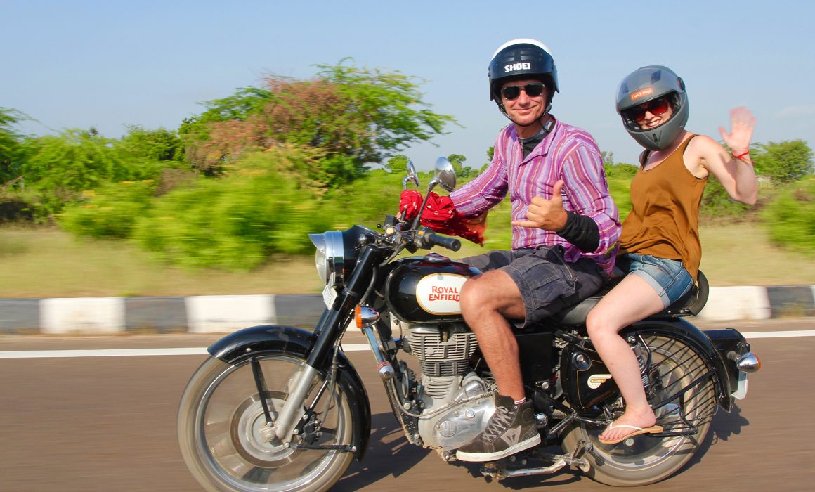 Man and woman on motorbike