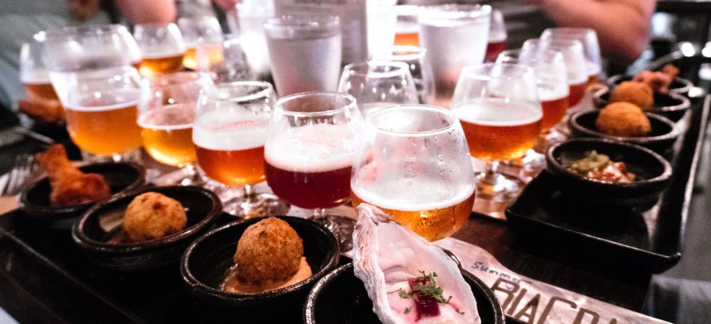 Beers and assorted appetizers in bar in Taiwan